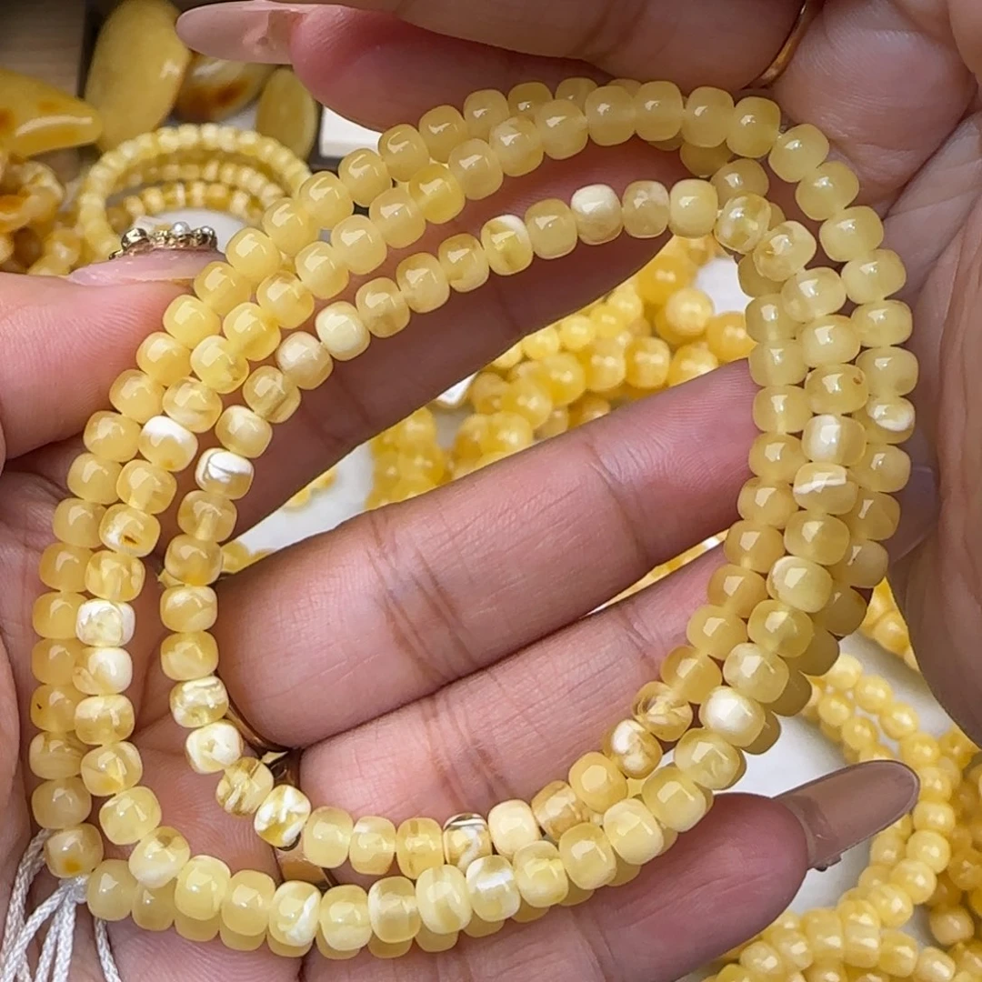 蜜蜡未镶嵌手串金白老型多圈