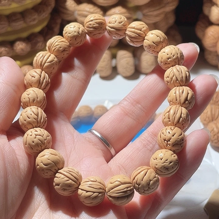 文***。桃核吊坠桃核手串暴力。11