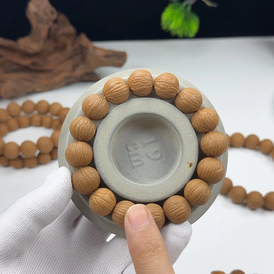 吊坠猴头核桃全品凤羽