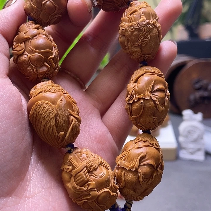 随***欲吊坠橄榄核橄榄核雕