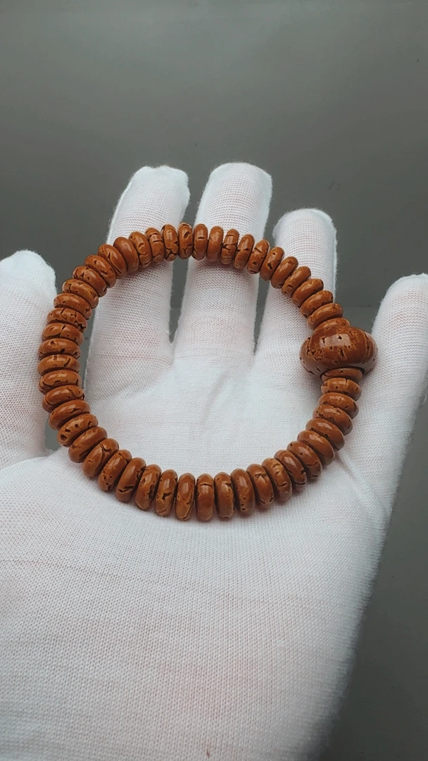 桃核大核片4×10（盘缠）手串瑕疵品