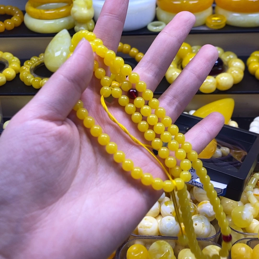 乐***儿乐燕儿鸡油黄珠链卡8