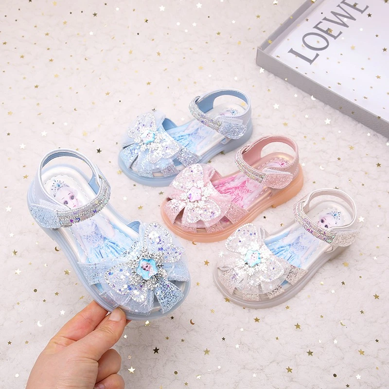 2025女童鞋皮革拼接包头夏季镂空凉鞋软底女宝艾莎公主鞋水晶鞋韩