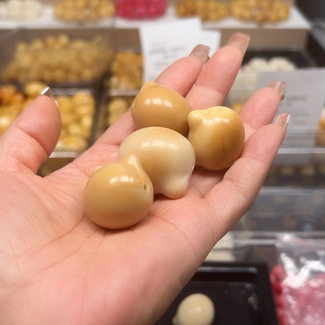 暖***暖手串菩提根/象牙果瑕疵茶色猫头4颗有裂