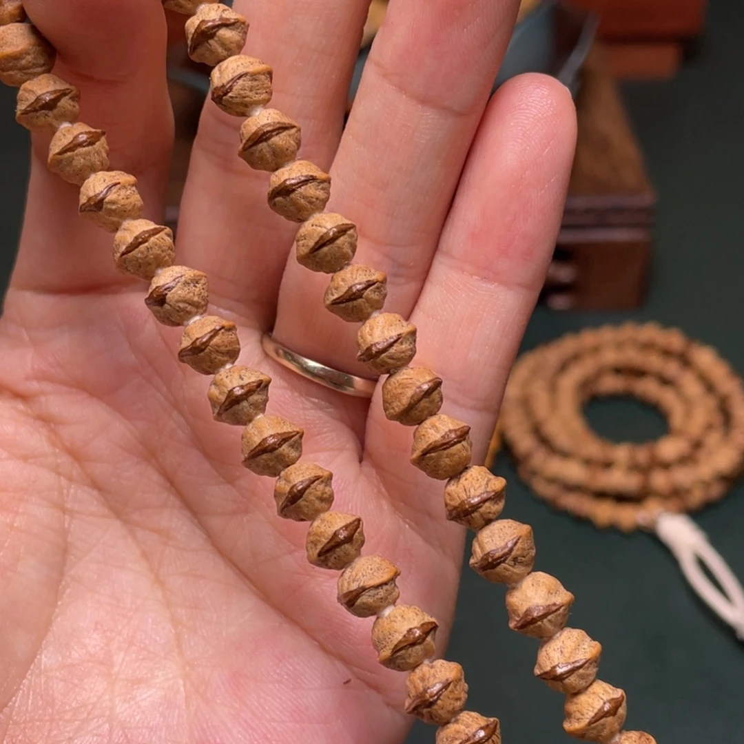 吊坠柏香籽/百香籽恶魔之眼手持