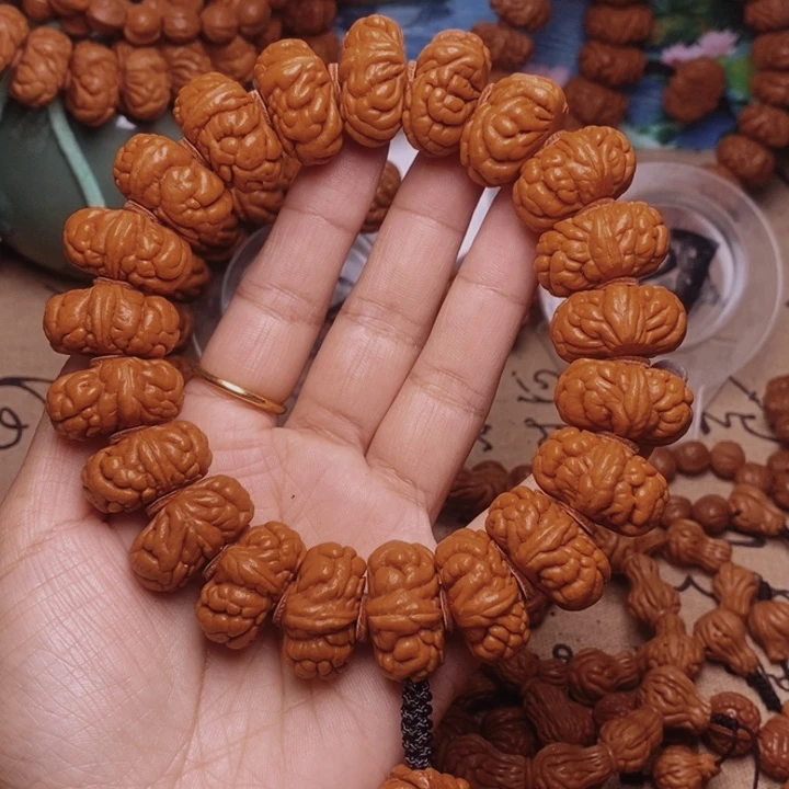 奕***辰手串文玩核桃龙纹桃核
