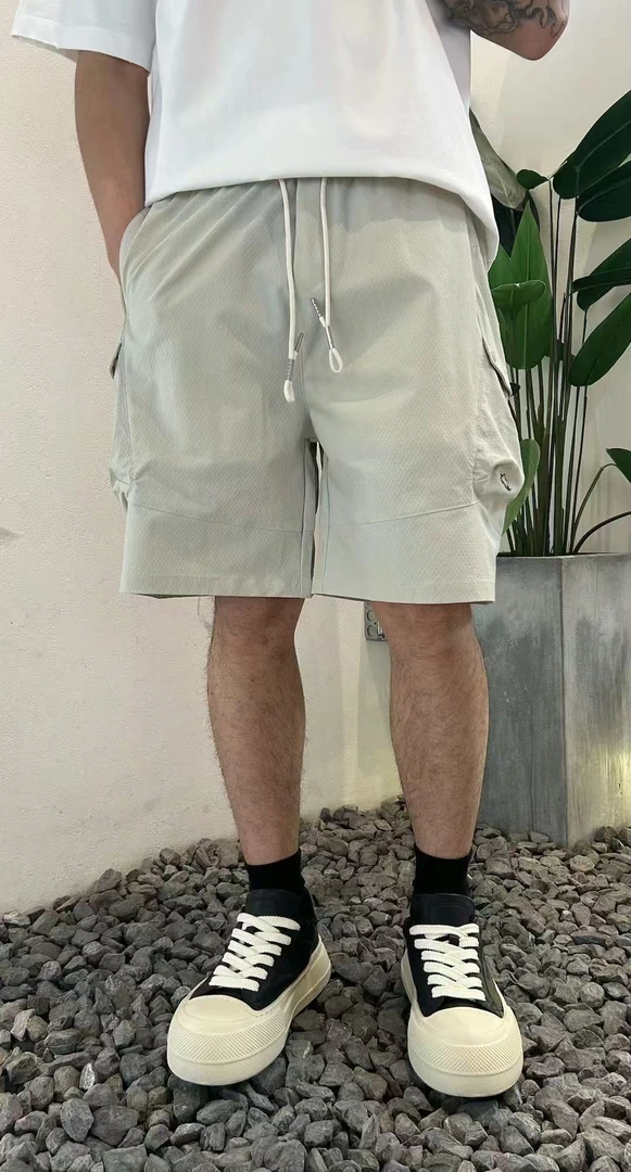 86235291素风2025男士时尚宽松潮流纯色抽绳肌理纹薄清凉休闲短裤