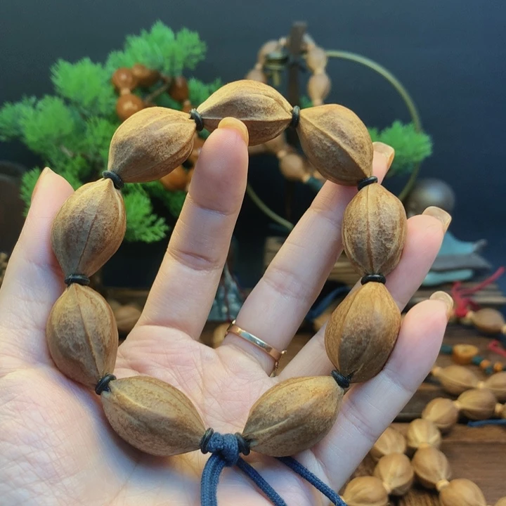 橄榄核手串梅林铁盒手串19.29