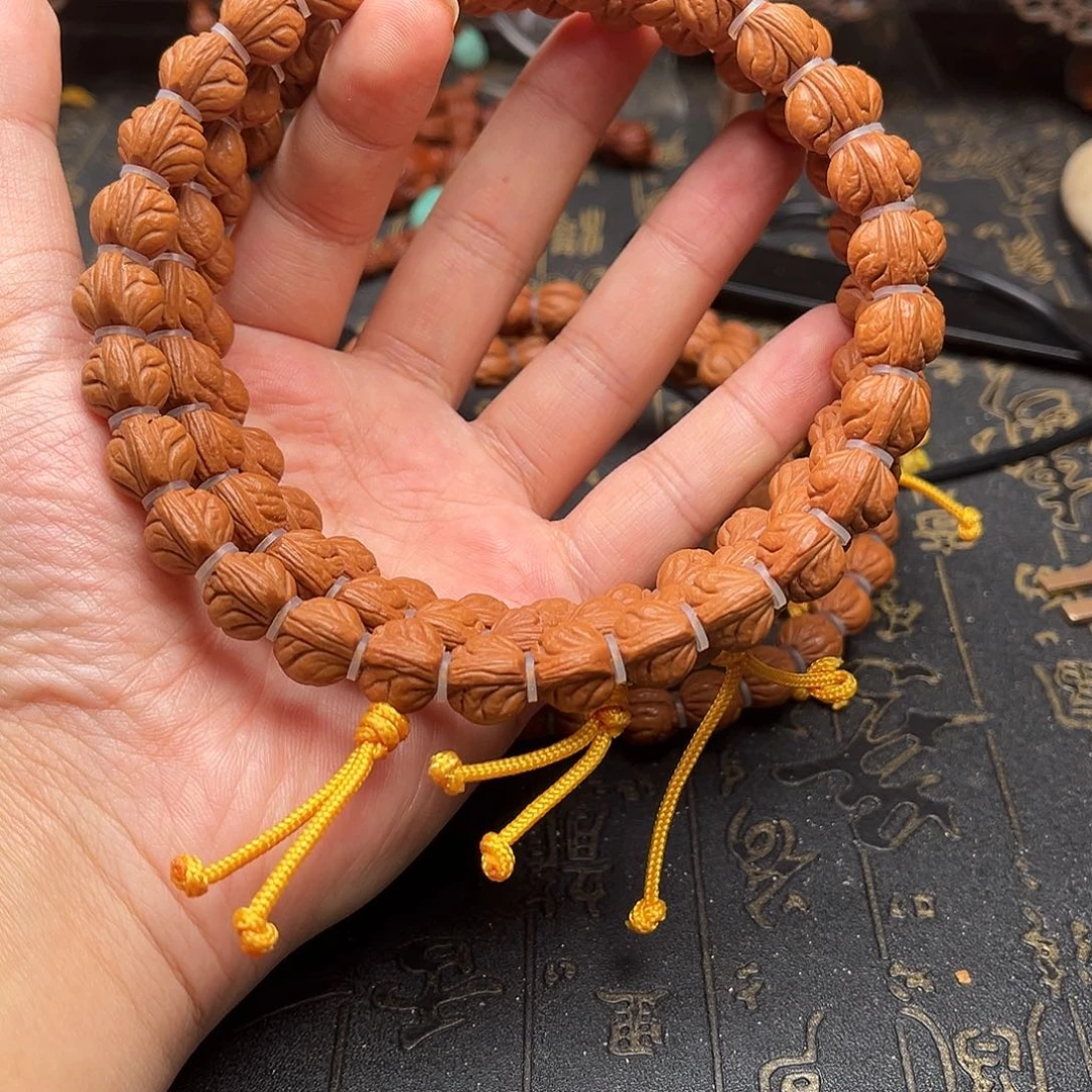 桃核吊坠玉龙手持