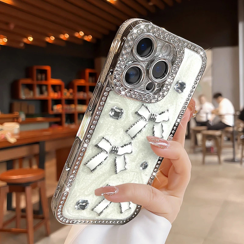 高级镶钻立体蝴蝶结适用苹果16手机壳iPhone15时尚14奢华13女款12