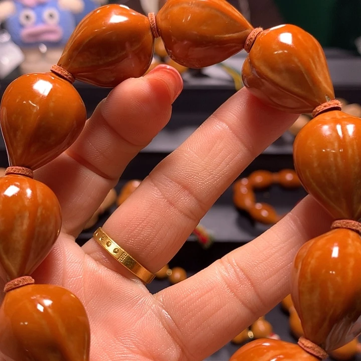 溪***沐橄榄核手串/手链三花手串