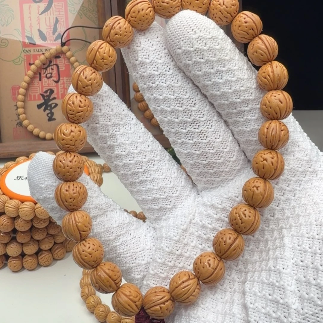 手串桃核1.1加「黄金瞳」野生桃核手持
