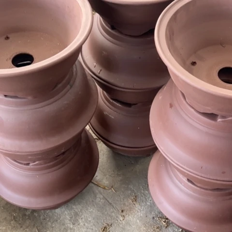 紫砂花盆300元15只。  34×15