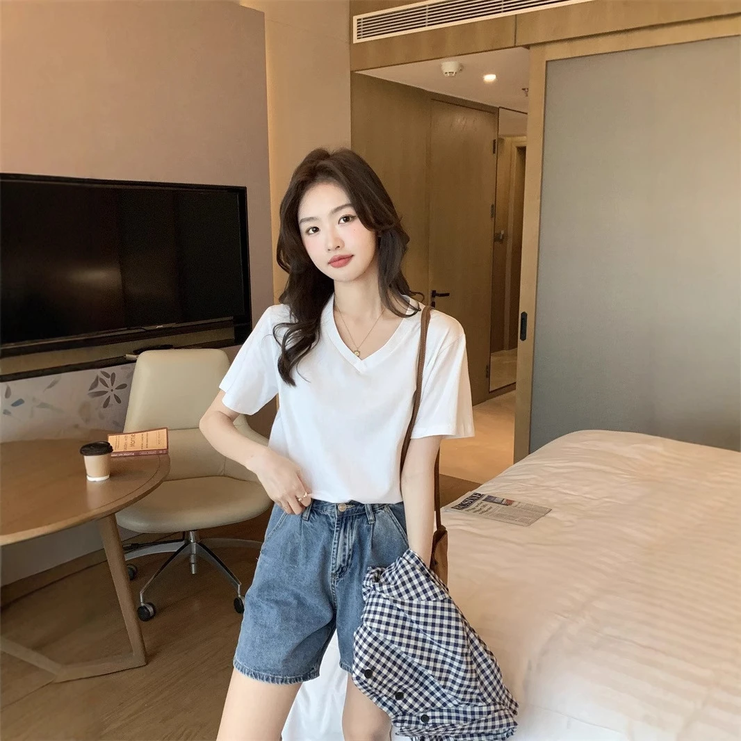 2025夏季新款时尚显瘦不规则设计感白色圆领小众百搭休闲风女款