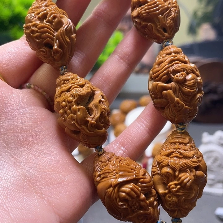 楊***東橄榄核吊坠橄榄核雕