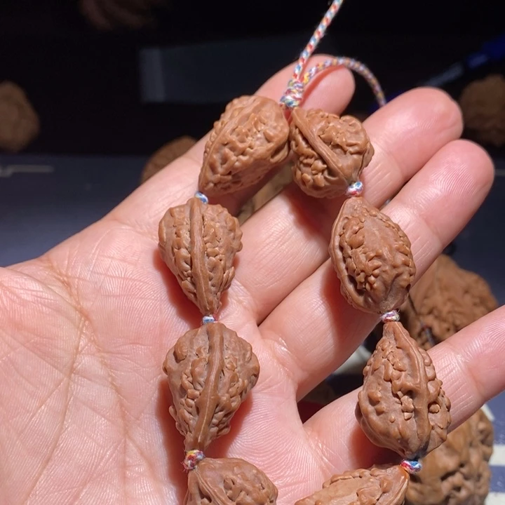 周***洲吊坠文玩核桃麒麟角