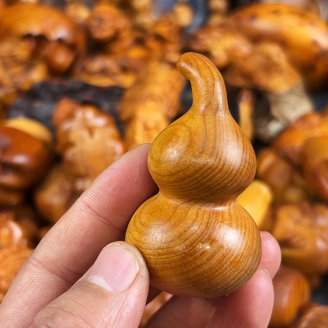 柏木太行崖柏塘心玉化手把件