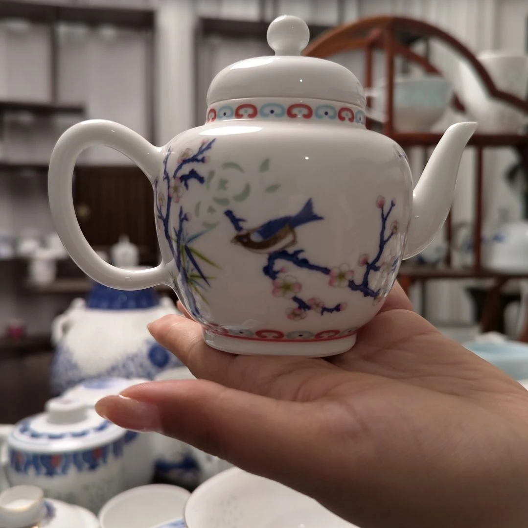 瓷梅雀报喜茶壶一个