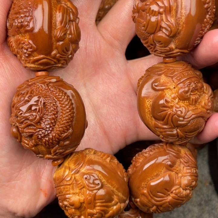 地***库文玩核桃吊坠橄榄核