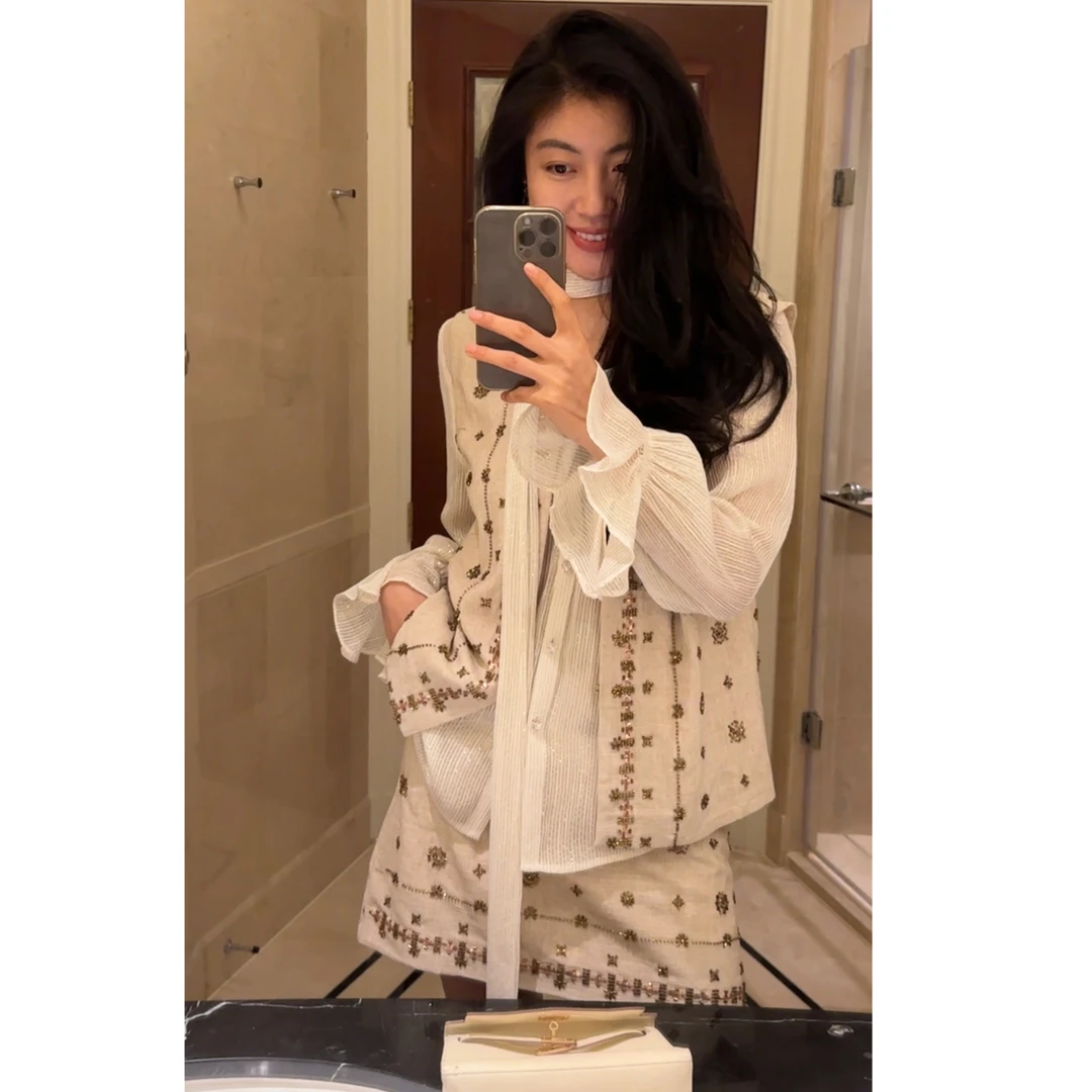 N.COU妮蔻25秋新款轻奢小众百搭通勤仙气飘飘领巾长袖上衣DY61099