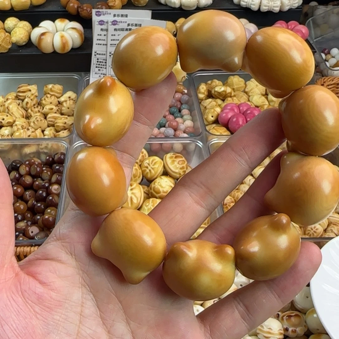 吊坠菩提根/象牙果卡29炭烤猫头手串一条