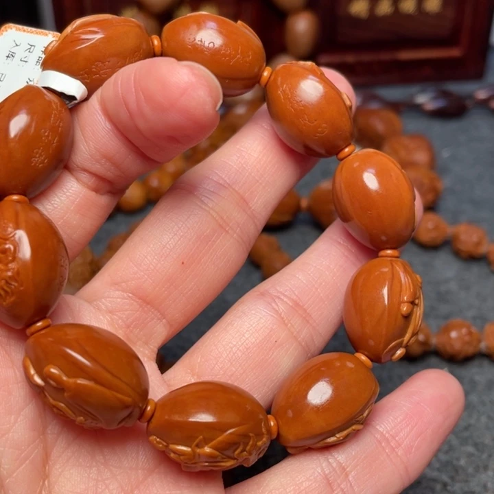 橄榄核吊坠退***彩橄榄核