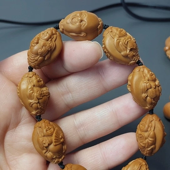 九龙弥勒，橄榄核雕工艺