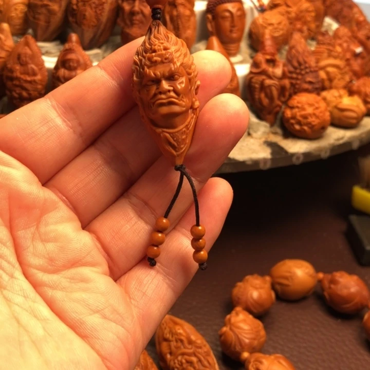 艺***点橄榄核吊坠橄榄核雕刻的手把件