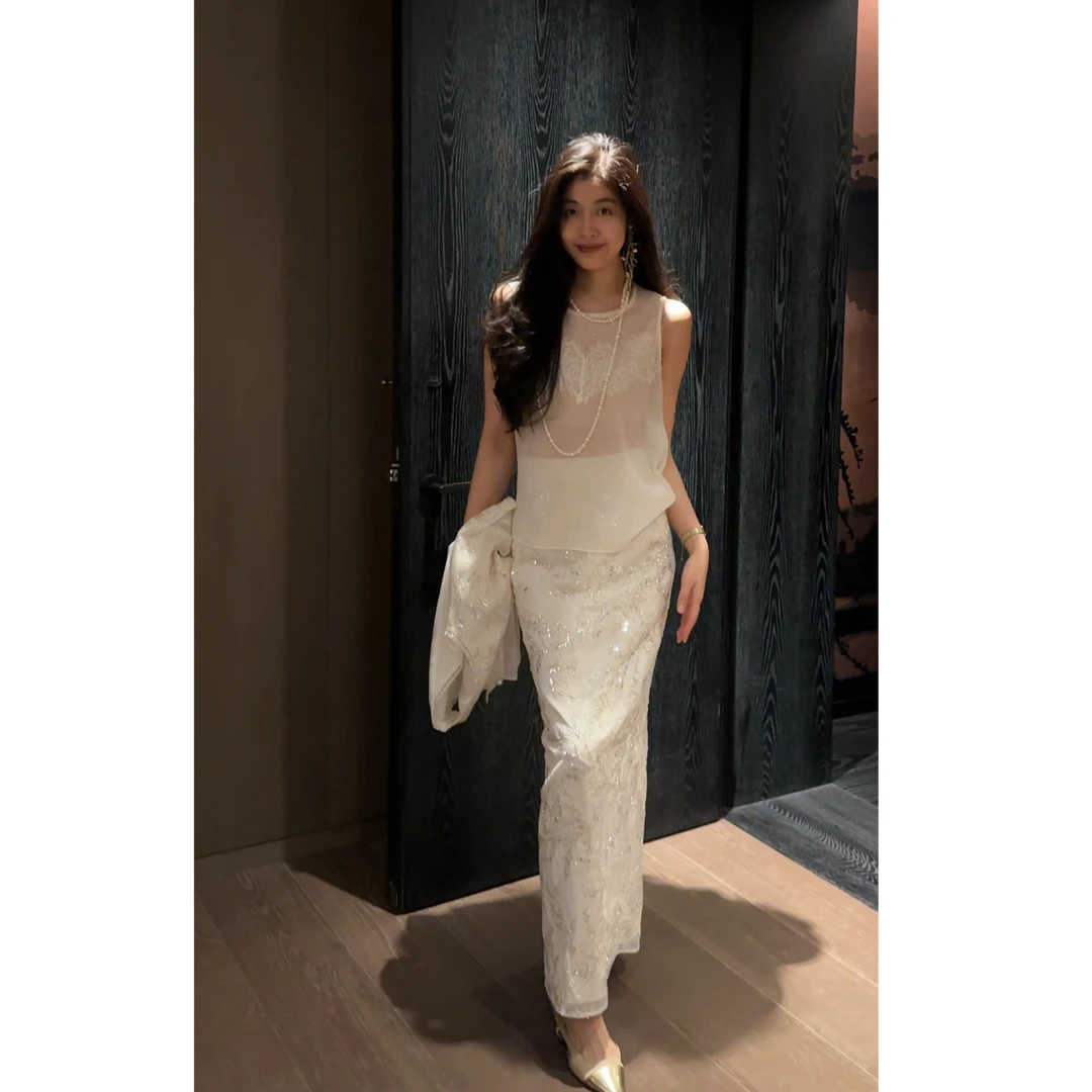 N·COU妮蔻25春新款透视钉珠圆领闪闪肌理感无袖短袖上衣女DY60657