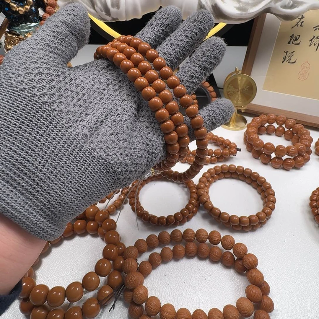 姣****猴头核桃吊坠老型长串