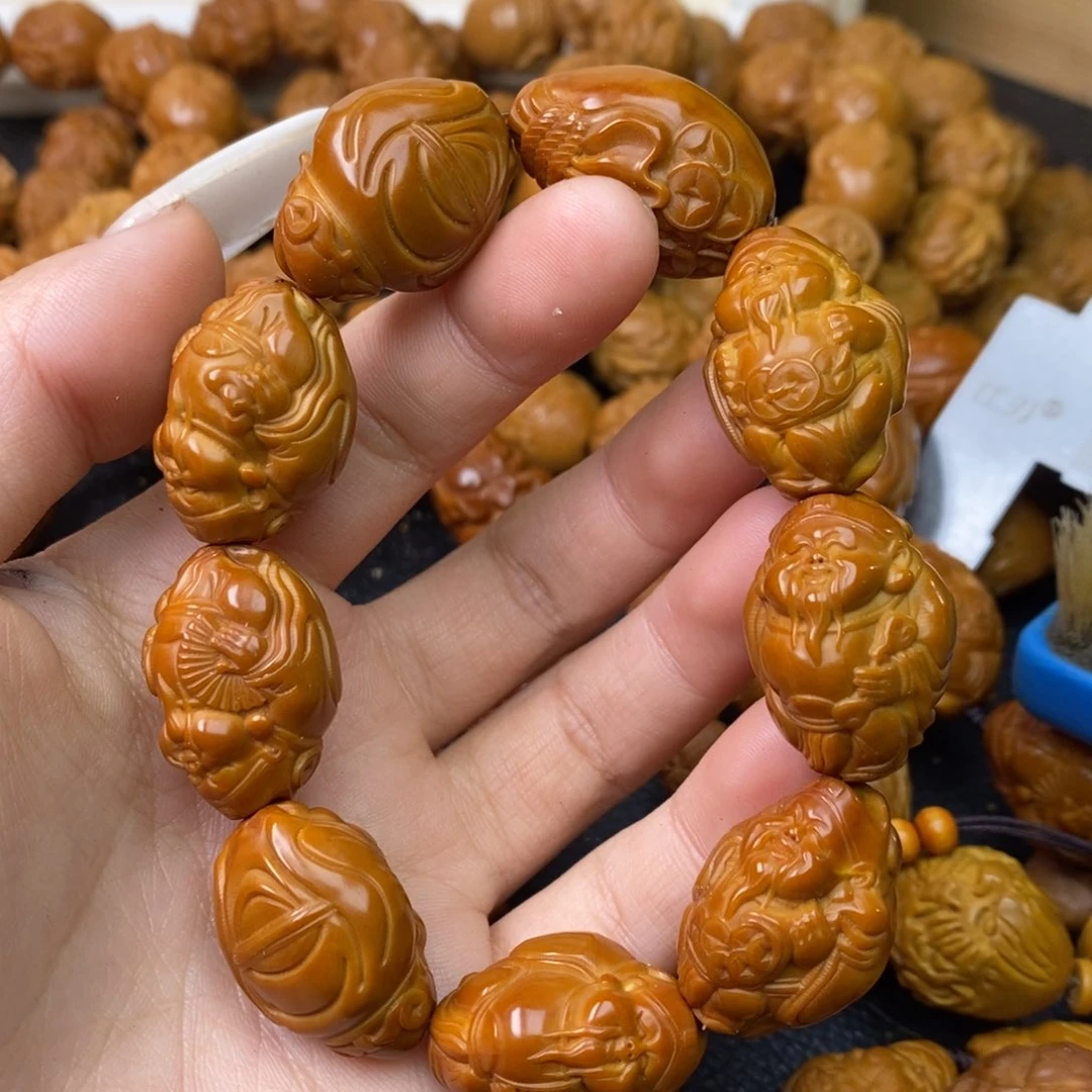 橄榄核吊坠难***我橄榄核上色财神