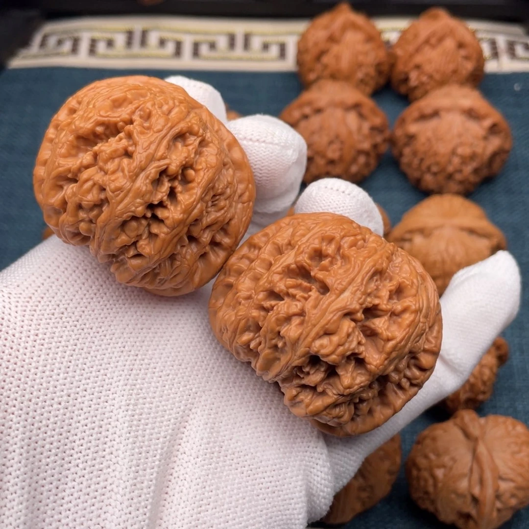 文玩核桃把件46.5全品红皮球筋