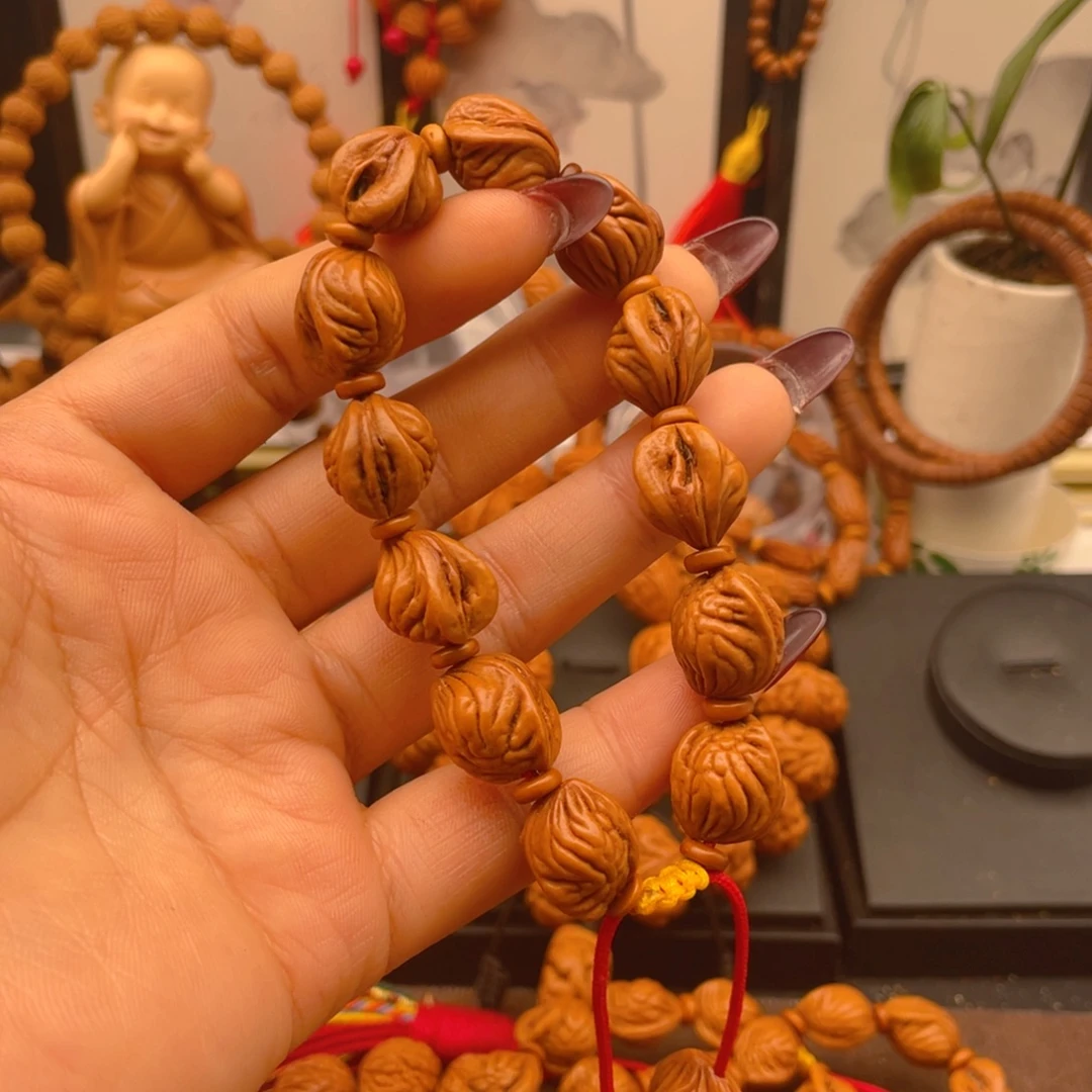 *****手串桃核红红火火。红红火火