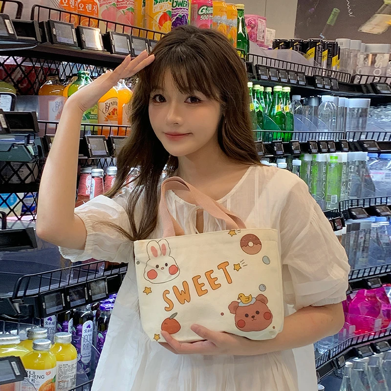 迷你简约帆布包包上班通勤学生手提化妆袋时尚百搭迷你少女手提包