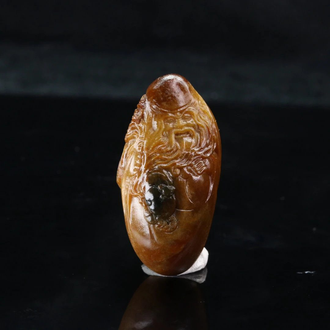 28和田玉聚黄皮寿星吊坠/500174上海嘉禾拍卖