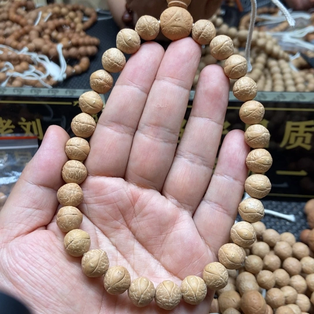凤眼菩提吊坠12+精品手持