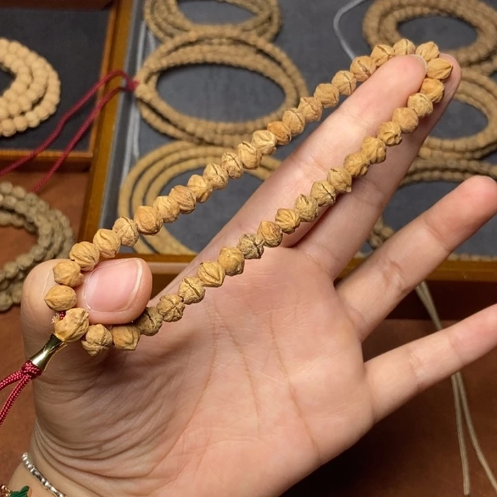 柏香籽/百香籽吊坠尘龙手持