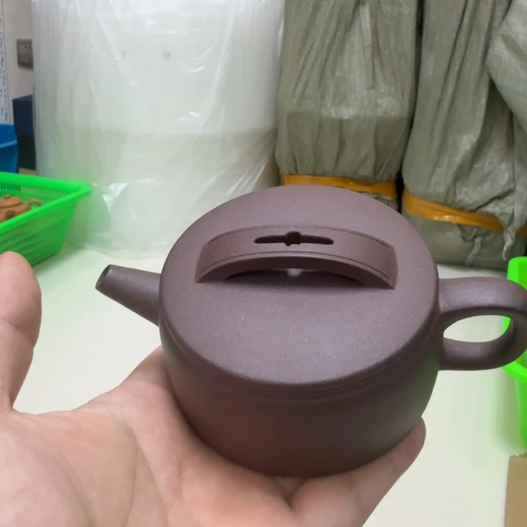 茶杯紫砂微瑕的壶