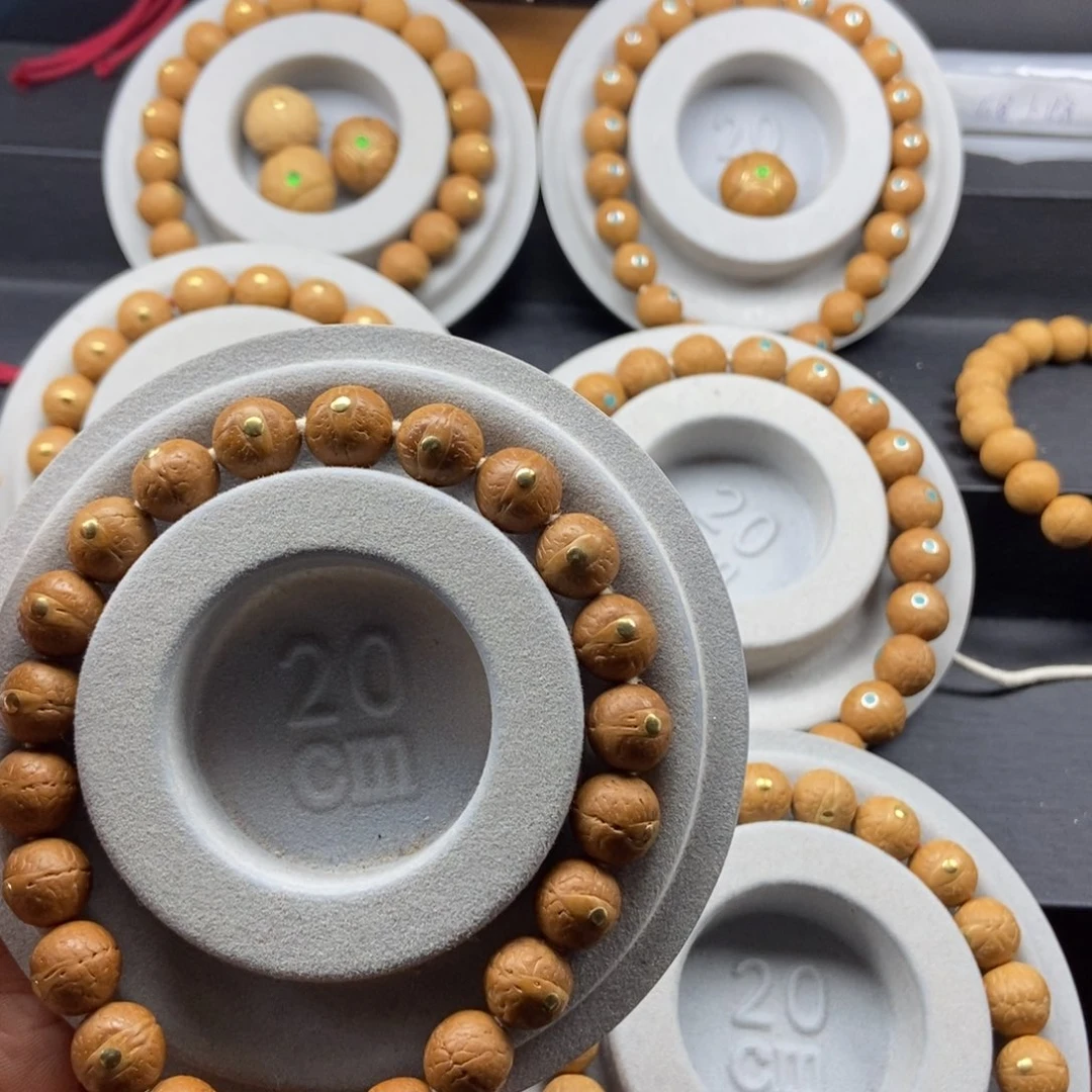 欢***豆凤眼菩提手串11➕铜