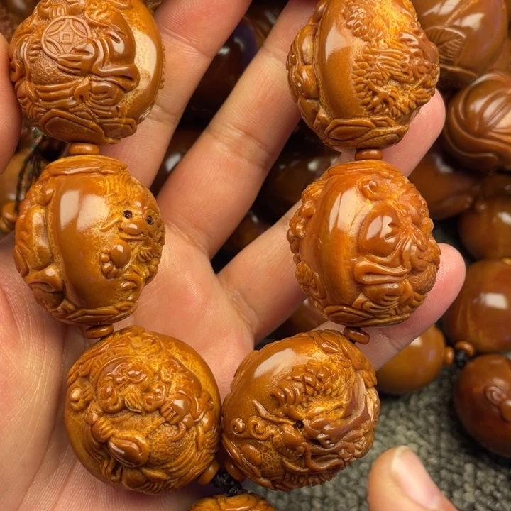 橄榄核吊坠?****?橄榄核手持