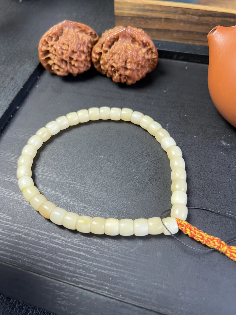 驼骨长串老黄料7x8手持手串