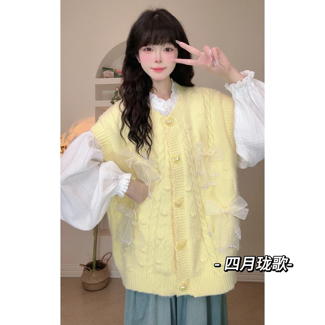 【顾茜茜专属】春季新款韩系蝴蝶结宽松珍珠爱心扣马甲女2266