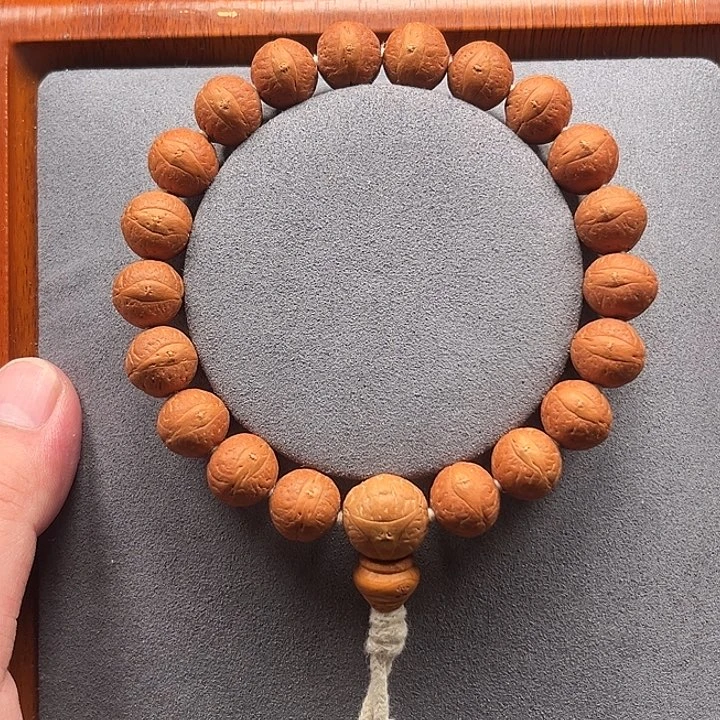凤眼菩提手串12.5矮圆油皮股眼手串