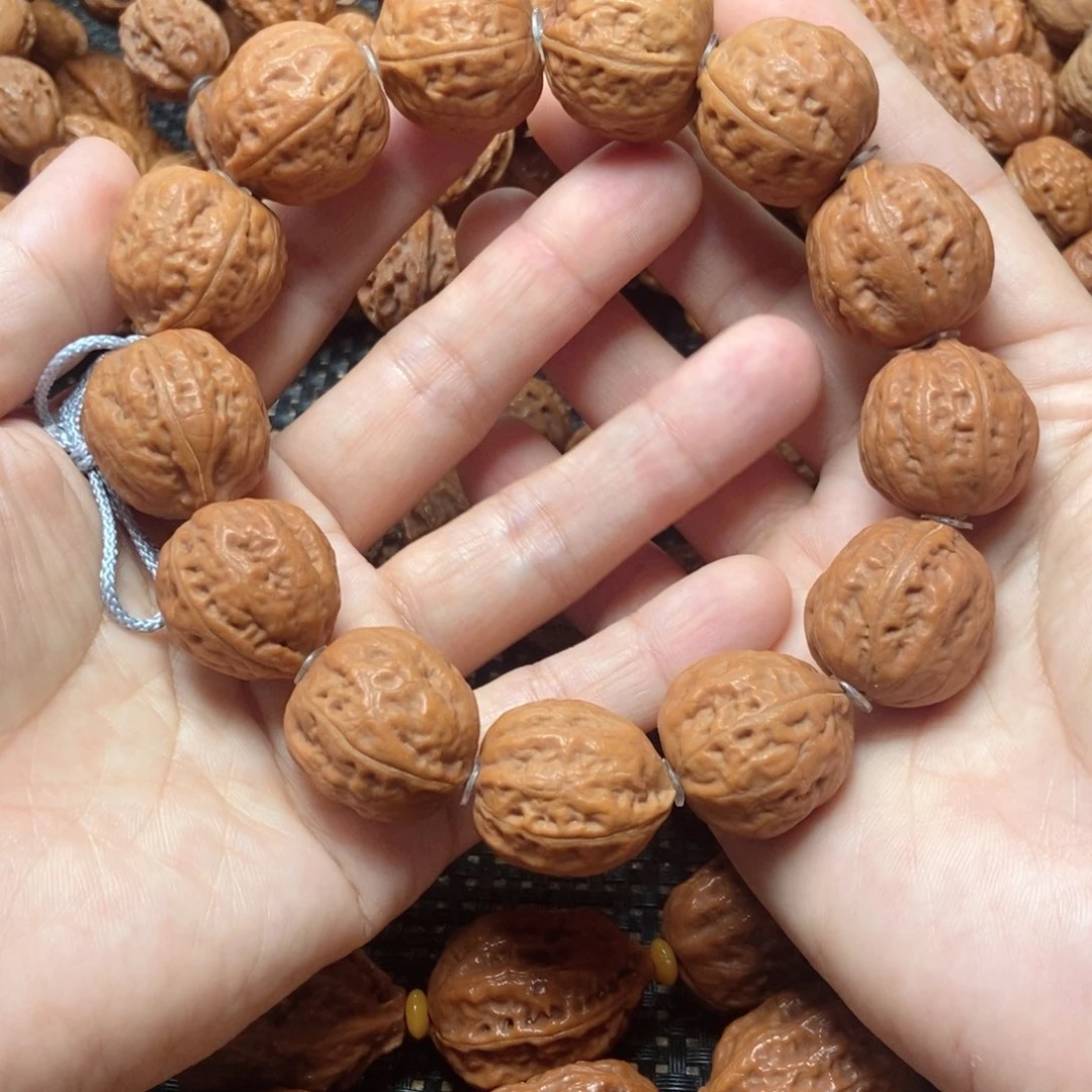 桃核吊坠粗筋手串