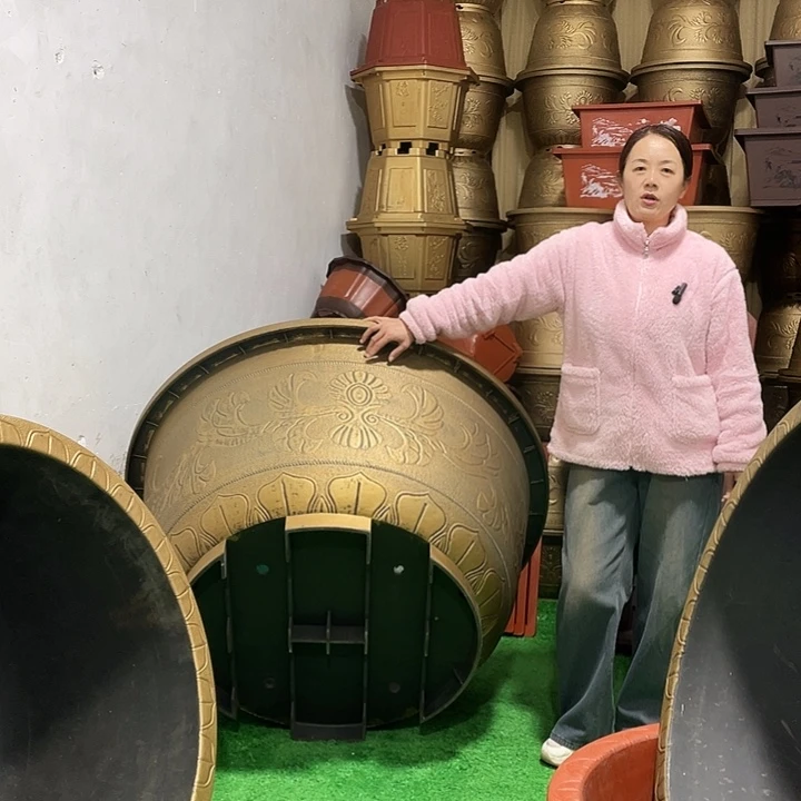 吴***水圆盆古铜一米二两个
