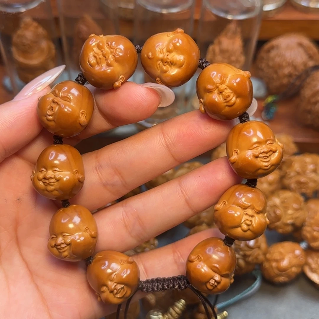 橄榄核吊坠童趣百态