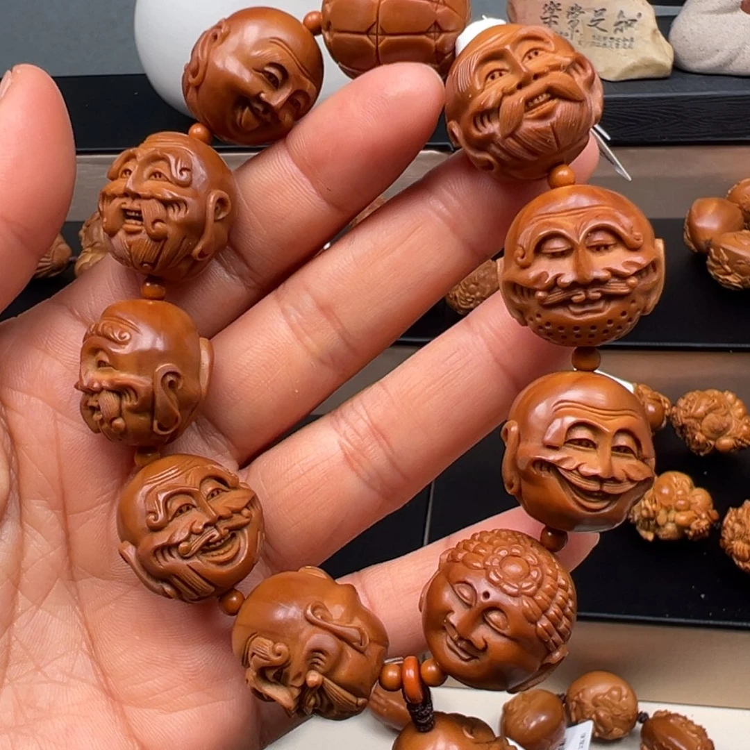 橄榄核吊坠罗汉手串