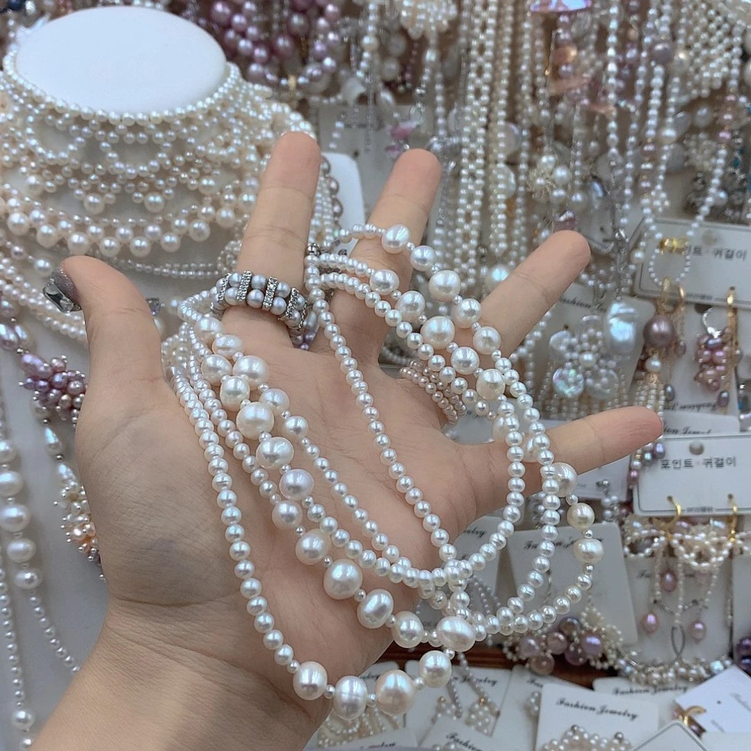 苹***果银S925镶嵌淡水珍珠耳饰