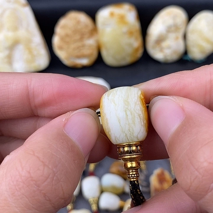 笑***佛琥珀未镶嵌裸石14金塔三通