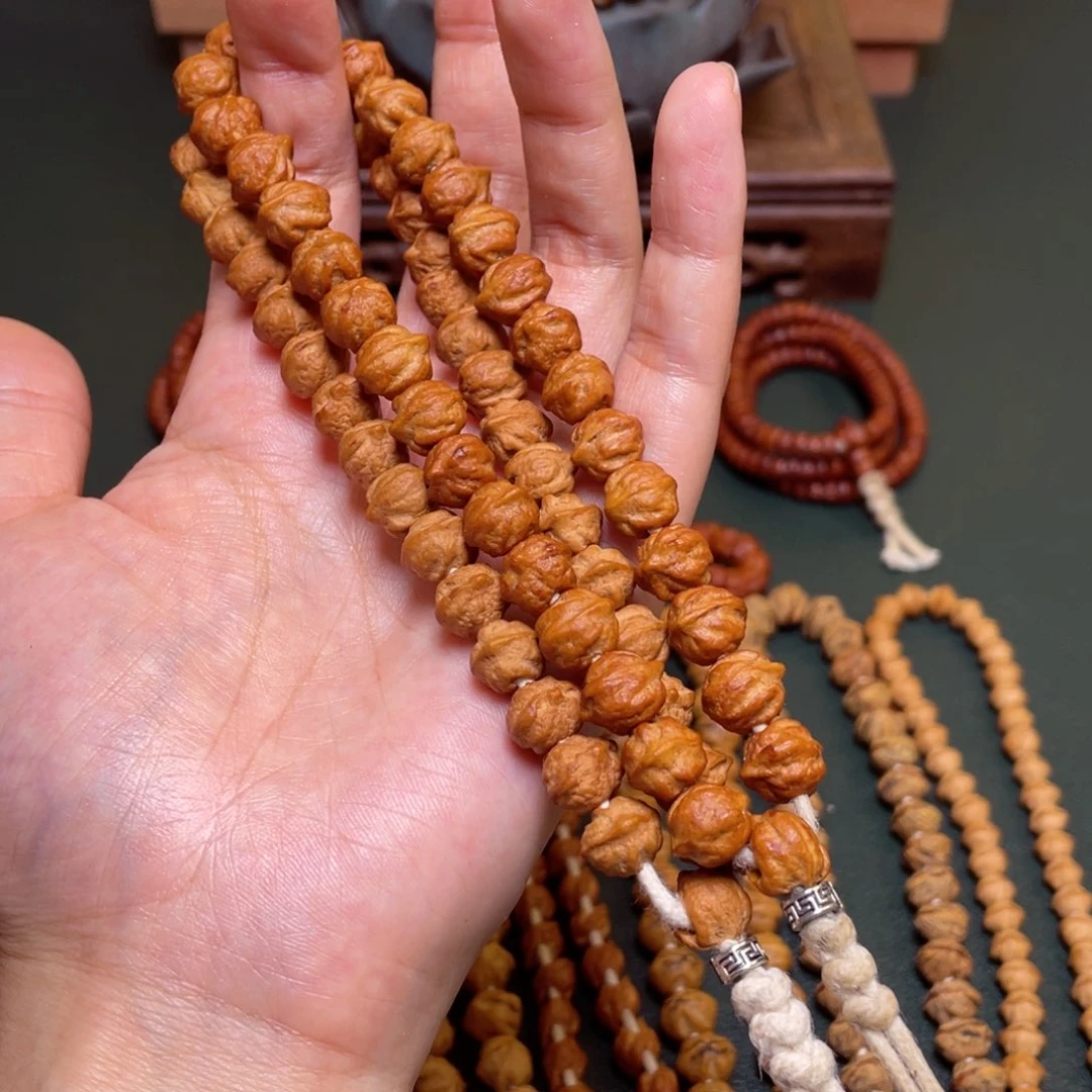 柏香籽/百香籽吊坠白牙横打手持